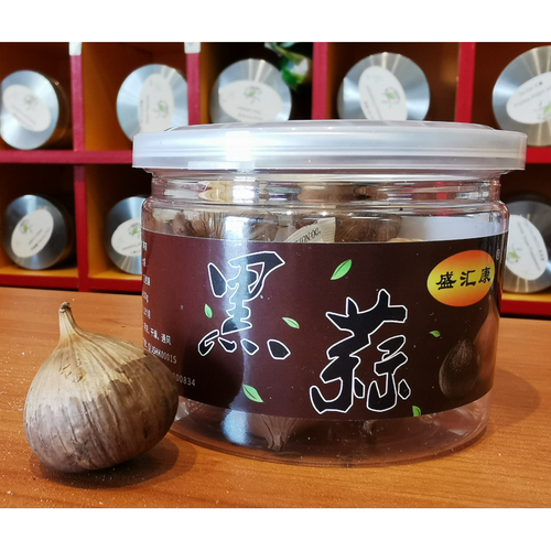 Black garlic cloves in a 100g jar for antioxidant and energy support