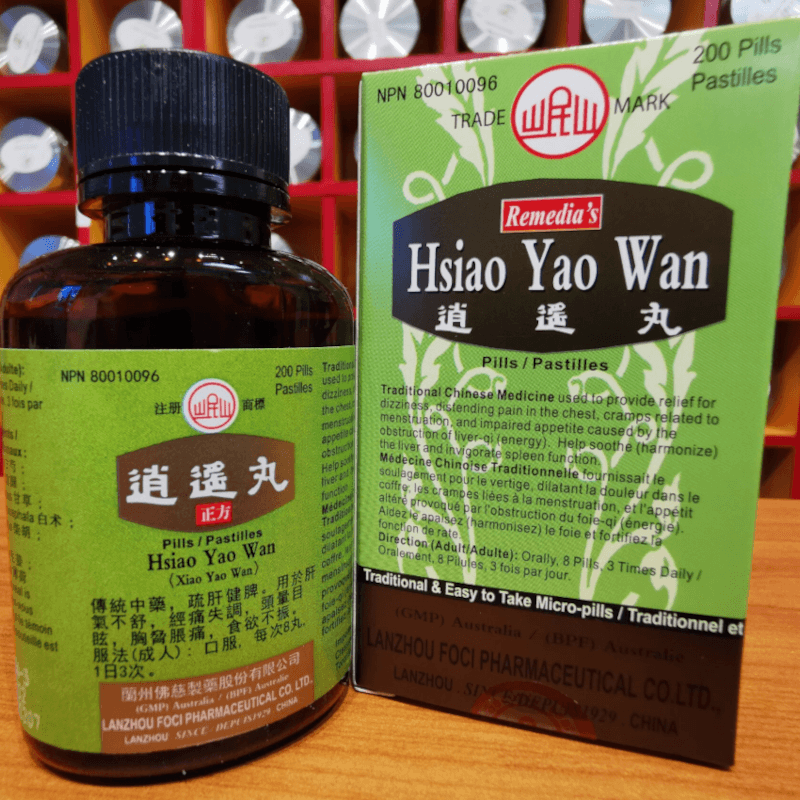 Hsiao yao wan bottle beside box.